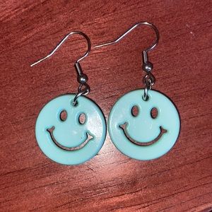 Light blue smiley face earrings